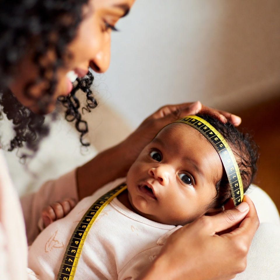 Baby being measured